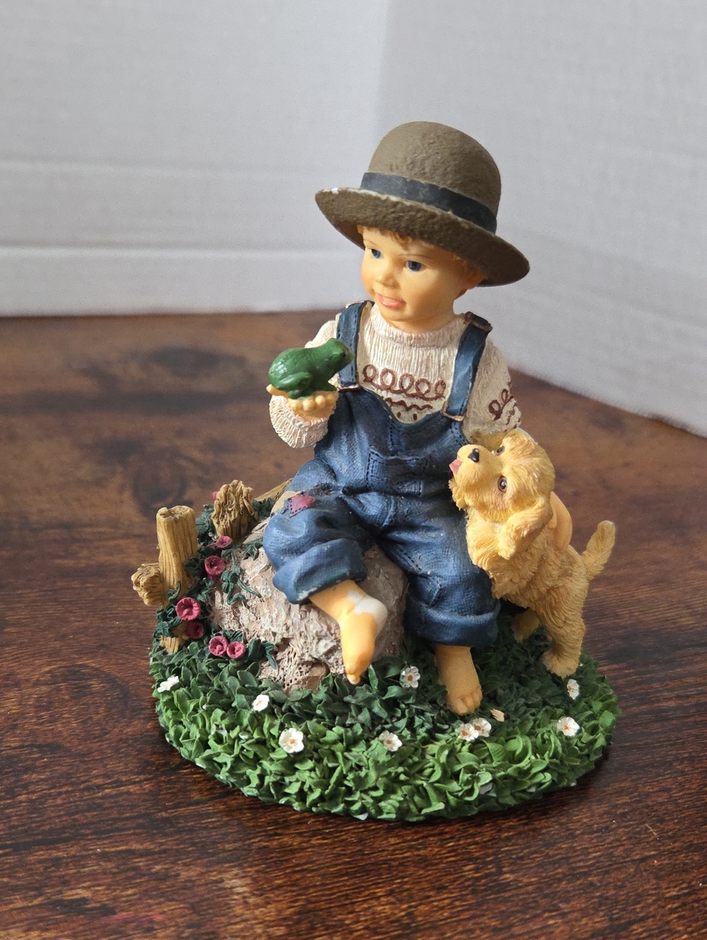 vintage Avon resin collectible figurine featuring a country boy in denim overall